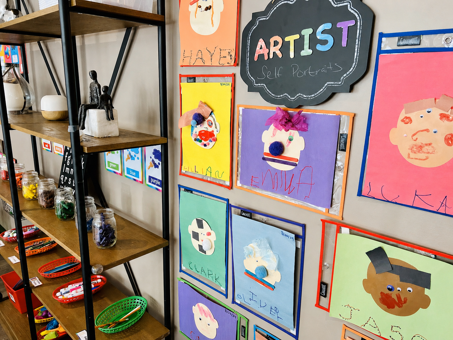 Children’s self-portraits displayed in the West Loop preschool classroom.